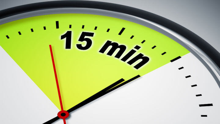 analog clock showng 15 minutes