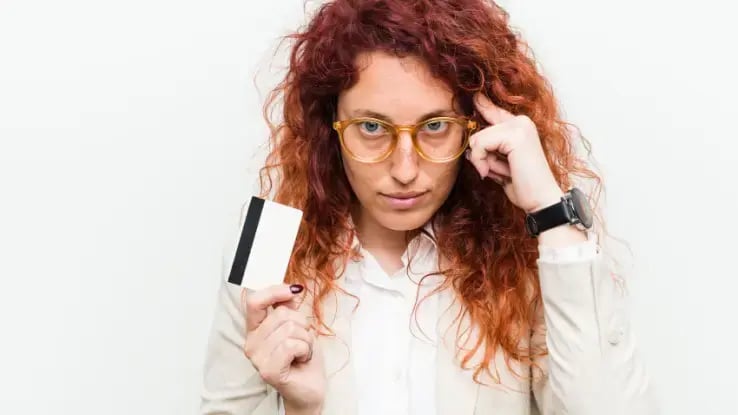 woman holding a credit card