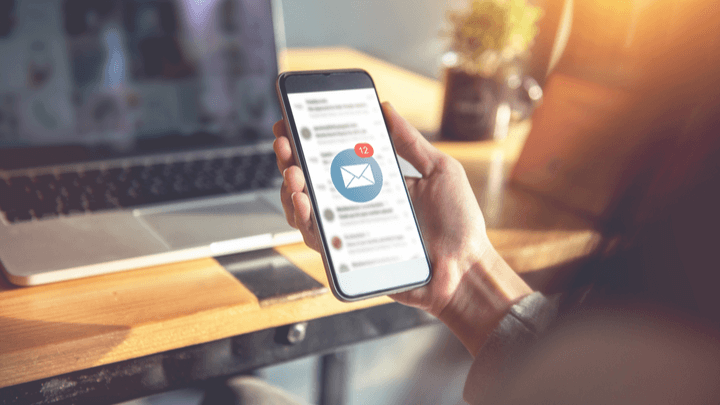 person receiving email on smartphone
